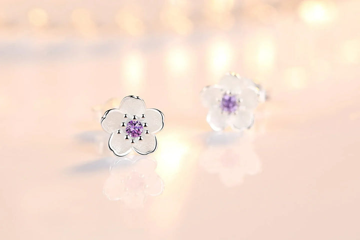 Boucles d'oreilles à bouton en forme de fleur avec zirconiums